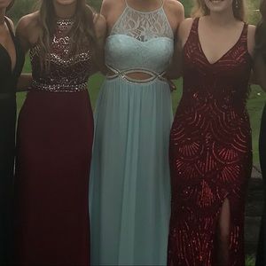 Light blue dress with silver jewels, open middle